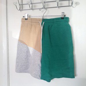green patchwork sweatshorts